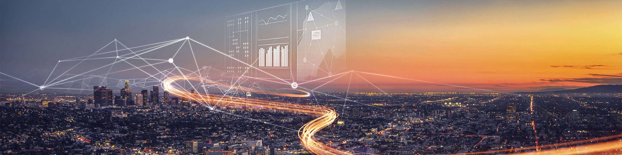 Energy analytics displayed over the top of a night sky photo of a city skyline.