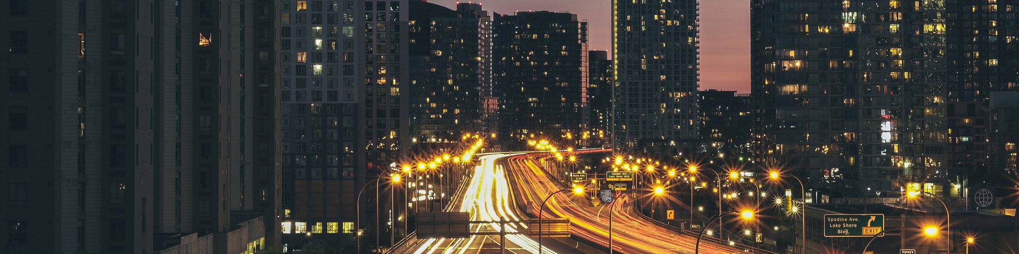 Long exposure image of a city at dusk.